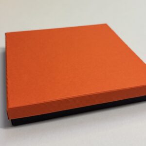 Quality Cardboard Collerette box, Mandarin Orange lid with black base with black inserts.