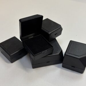 Our Abbey Range. Plastic boxes with a lift off lid in black.